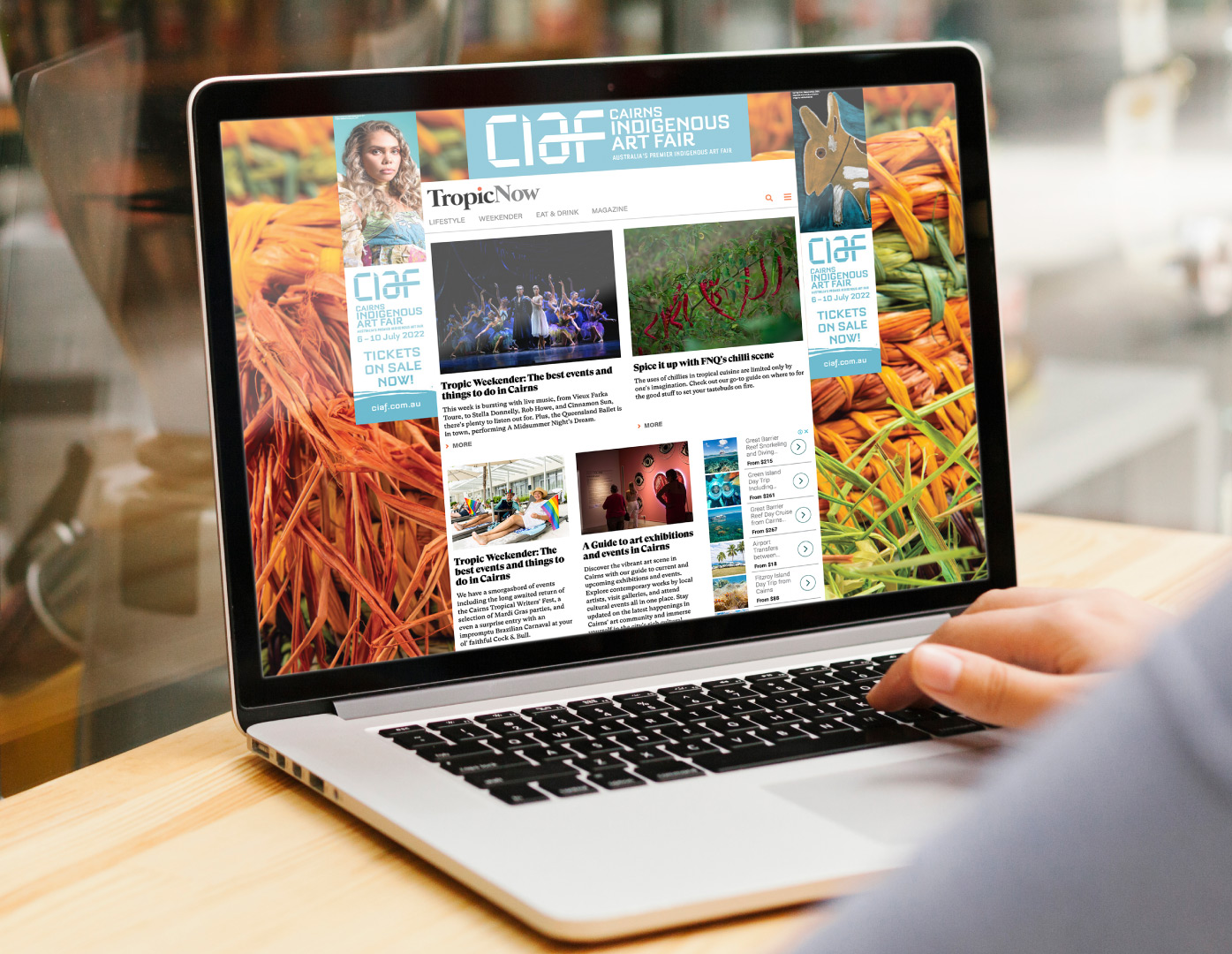 TropNow website on laptop