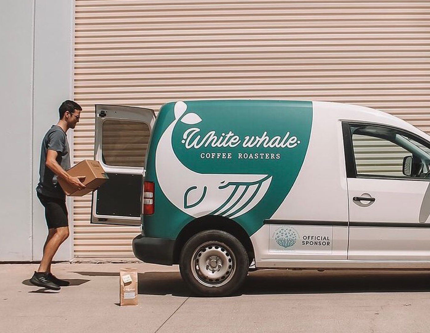 White Whale Coffee Roasters car wrap designed by Tropic Studio