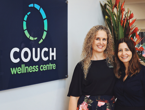 Couch Cairns office with two staff members